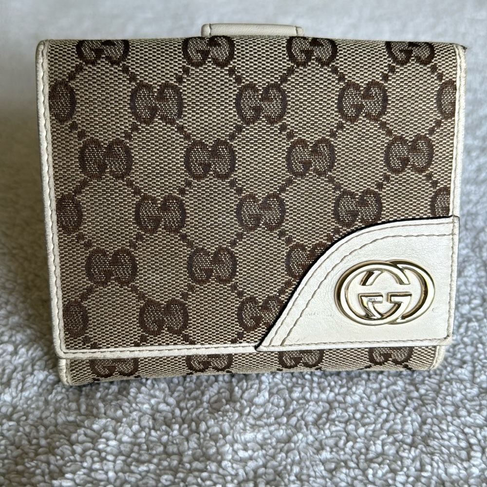 Gucci brown monogram wallet